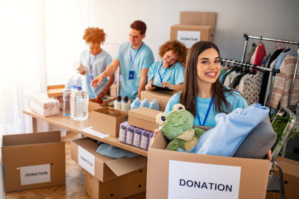 Volunteers packing donation boxes